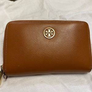 Brown medium Tory Burch wallet - shows signs of wear